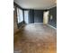 Spacious living room featuring carpet floors and neutral walls, offering a versatile living space at 392 Carey Se Dr, Atlanta, GA 30315
