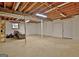 Unfinished basement featuring a concrete floor, exposed ceiling, and large space at 200 Deer Forest Trl, Fayetteville, GA 30214