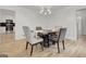 Dining room view showing access to a modern kitchen with stainless appliances at 200 Deer Forest Trl, Fayetteville, GA 30214