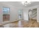 Living room featuring new floors and bright light from the windows at 200 Deer Forest Trl, Fayetteville, GA 30214