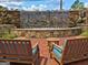 A decorative waterfall behind benches and tables in a common area of the community at 200 Deer Forest Trl, Fayetteville, GA 30214