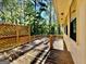 Charming back deck with wood lattice surround offering a private outdoor retreat with mature trees at 1327 Highway 54 E, Fayetteville, GA 30214