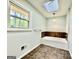 Bathroom with bathtub, window, and tile floor at 1327 Highway 54 E, Fayetteville, GA 30214