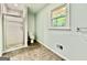 Bright bathroom with shower and tiled floors at 1327 Highway 54 E, Fayetteville, GA 30214