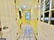 View of the mud room featuring tile floors, a sink, a window, and access to an exterior door at 1327 Highway 54 E, Fayetteville, GA 30214