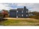 Large backyard with a patio and well-maintained lawn, perfect for outdoor activities and entertaining at 3028 Hallman Cir, Marietta, GA 30064
