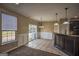 Kitchen with tiled floors, granite counters and pendant lighting at 3028 Hallman Cir, Marietta, GA 30064