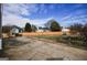 This spacious backyard is surrounded by a wood fence and has a concrete patio with green space at 3028 Hallman Cir, Marietta, GA 30064