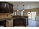 Kitchen featuring granite countertops, modern appliances, and a breakfast bar at 3028 Hallman Cir, Marietta, GA 30064