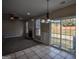 Living room with fireplace, large sliding glass doors and outdoor view at 3028 Hallman Cir, Marietta, GA 30064