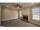 Spacious living room with a brick fireplace and large windows at 3028 Hallman Cir, Marietta, GA 30064