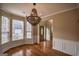 Bright dining room featuring a modern chandelier and large windows at 3028 Hallman Cir, Marietta, GA 30064