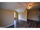 This bedroom offers laminate flooring, a ceiling fan, a closet, and a window to allow for natural light at 3028 Hallman Cir, Marietta, GA 30064
