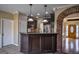 Modern kitchen with a breakfast bar, stainless steel appliances and pendant lighting at 3028 Hallman Cir, Marietta, GA 30064