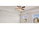 Bedroom featuring neutral carpet, ceiling fan, and large windows at 564 Whitman Ln # 2017, Stockbridge, GA 30281