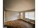 Inviting living room with wood floors, ample natural light, and neutral walls at 1779 Rosewood Rd, Decatur, GA 30032