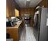 Functional kitchen with stainless steel appliances and ample storage at 9055 Kelly Ct, Jonesboro, GA 30236