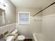 Bathroom featuring granite vanity top and white tiled walls at 3011 Belvedere Ln, Decatur, GA 30032
