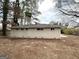 Backyard featuring neutral colored siding and windows at 3696 Aldea Dr, Decatur, GA 30032