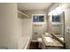 Bathroom features granite countertops, new cabinets and a tiled shower at 3696 Aldea Dr, Decatur, GA 30032