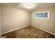 Bedroom with carpet, a window, a ceiling light and neutral paint at 3696 Aldea Dr, Decatur, GA 30032