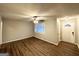 Inviting living room with wood floors, neutral paint, and a ceiling fan at 3696 Aldea Dr, Decatur, GA 30032