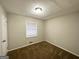 Cozy bedroom featuring neutral paint, a window, and carpeted floors at 3711 Tulip Dr, Decatur, GA 30032