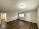 Inviting living area with wood-look floors and neutral color scheme at 3711 Tulip Dr, Decatur, GA 30032
