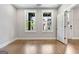 Bright bedroom with hardwood floors, natural light from windows, and neutral wall paint at 1028 Robert Smalls Way, Atlanta, GA 30318
