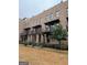 Brick townhome with stylish balconies, offering a blend of classic and modern design elements at 1028 Robert Smalls Way, Atlanta, GA 30318