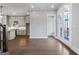 Bright open concept living room and kitchen with hardwood floors, and glass doors to the outside at 1028 Robert Smalls Way, Atlanta, GA 30318