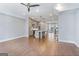 Inviting living space with wood floors that flows into a modern, neutral kitchen at 1028 Robert Smalls Way, Atlanta, GA 30318