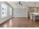 Open-concept living room showcasing wood floors and a modern kitchen at 1028 Robert Smalls Way, Atlanta, GA 30318