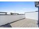 Clean rooftop deck showcasing gray flooring and white accents, offering a versatile outdoor space for relaxation and enjoyment at 1028 Robert Smalls Way, Atlanta, GA 30318