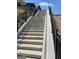Outdoor concrete stairway with black metal railings leads to new construction homes at 1028 Robert Smalls Way, Atlanta, GA 30318