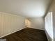 Bright living room featuring dark wood floors, neutral walls, and natural light from the window at 105 Hillside Se Ave, Atlanta, GA 30315