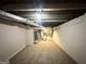 View of unfinished basement utility room showing exposed rafters and ductwork at 105 Hillside Se Ave, Atlanta, GA 30315