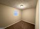 Cozy bedroom with neutral walls, plush carpeting, and ample natural light at 3507 Sage Dr, Lithia Springs, GA 30122