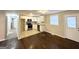 An efficiently designed kitchen with stainless steel appliances and abundant white cabinetry at 360 Belgarde Pl, Atlanta, GA 30354