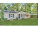 Charming single-story home with a well-maintained front yard and classic architectural details at 2174 Doris Dr, Decatur, GA 30034