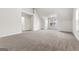 Bright, carpeted bedroom with large windows offering ample natural light at 2916 Ward Lake Way, Ellenwood, GA 30294