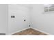 Bright laundry room with tile flooring at 2916 Ward Lake Way, Ellenwood, GA 30294