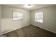 Serene bedroom with soft carpet and large windows for natural lighting at 312 Fairburn Nw Rd, Atlanta, GA 30331