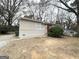 Traditional home with a brick foundation and a tidy front yard at 312 Fairburn Nw Rd, Atlanta, GA 30331