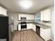 Modern kitchen featuring stainless steel appliances and granite countertops at 312 Fairburn Nw Rd, Atlanta, GA 30331