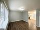 Inviting living room featuring wood-look flooring and bright, neutral paint at 312 Fairburn Nw Rd, Atlanta, GA 30331