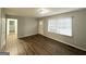 Comfortable living room with wood-look floors and a freshly painted interior at 312 Fairburn Nw Rd, Atlanta, GA 30331