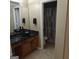 Bathroom with dual sinks and a large mirror at 10020 Crystal Ter, Jonesboro, GA 30238