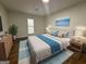 Bedroom with luxury vinyl plank flooring, neutral paint, and nice natural light at 115 Paces Way, Fayetteville, GA 30215