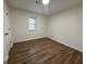 Clean bedroom with modern flooring and plenty of natural light at 115 Paces Way, Fayetteville, GA 30215